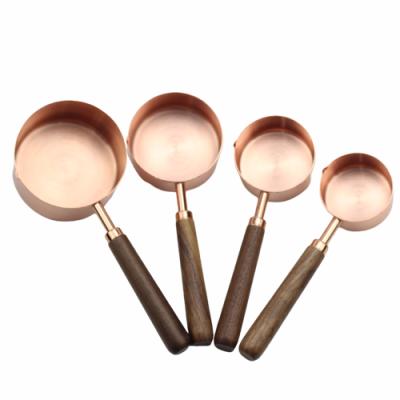 China OTOware Sustainable Popular Durable Rose Gold 410 Stainless Steel Measuring Cups With Wood Handle for sale