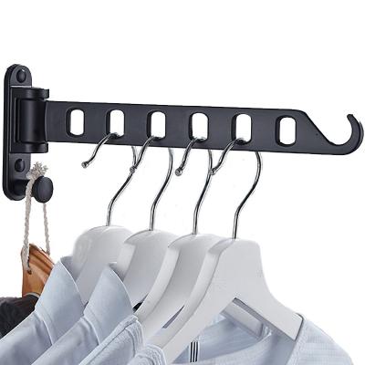 China Durable Wholesale Wall Mounted Folding Clothes Rack Retractable Clothes Rod Home Laundry Drying Rack Space Saving for sale