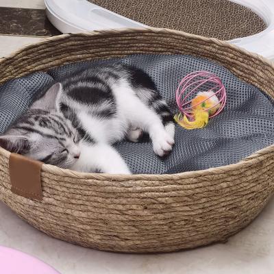 China Sustainable Wholesale Hand Woven Wicker Summer Cool Cat House Natural Rattan Pet Bed for sale