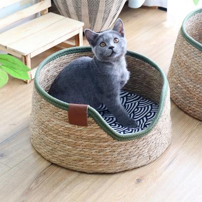 China Sustainable Handmade Wicker Natural Seagrass Rattan Sweet Cat Bed Warm Pet Basket for sale