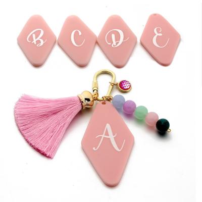 China Promotion Gift Creativity A-Z Letters Keyring Keychain Geometric Rhombus Acrylic Tassel Beads Initial Key Chain for sale