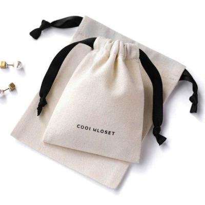 China Durable Custom Waterproof Logo White Drawstring Shopping Bag Garment Suction Bag Woven Bags for sale