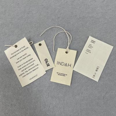 China Sustainable Biodegradable Luxury Thick Fabric Hanger Tag For Swimsuit / Jeans / Garment Clothes Label for sale