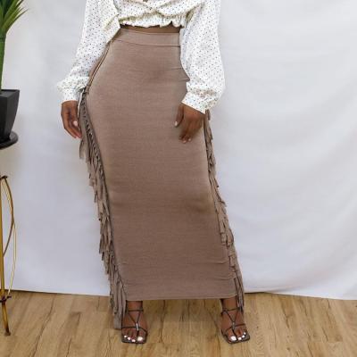 China 2021 New Arrivals Viable Fall Winter Fashionable Dress High Waist Solid Elastic Tassel Skirt Cheap Women Plus Size Long Maxi Skirts for sale