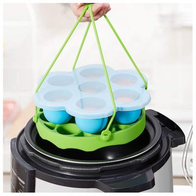 China Sustainable Portable Reusable Silicone Egg Holding Holder Reusable Steamer For Boiled Eggs for sale