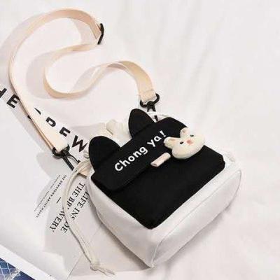 China TYW100058 Japanese Style Simple Messenger Bag Cute Student Art One-Shoulder Mobile Phone Bag for sale