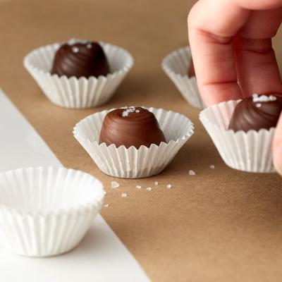 China 2.5inch Disposable White Greaseproof Paper Cake Cup Food Grade Cupcake High Temperature Resistant Liners for sale