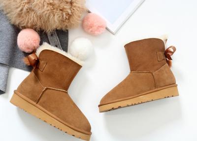 China Comfortable / Warm Ankle Length Boots Anti Slip Ladies Sheepskin Boots With Wool Lining for sale