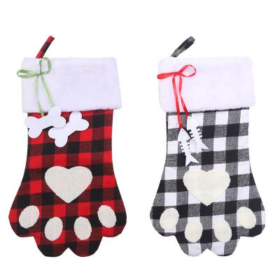 China Short Plush; Coating of the non-woven fabric; Red and Black Paw Socks Creative Christmas Stocking Dog Plaid Felt Fabric Decoration for sale