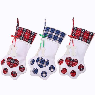 China Creative Fabric Plaid Christmas Storing Christmas Decoration Christmas Pet Stocking Gift Bag for sale