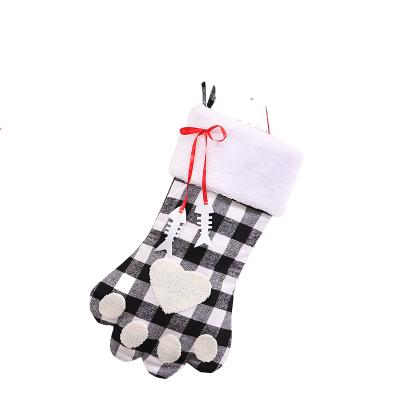 China Short Plush; Coating of the non-woven fabric; Fabric Christmas Gift Bag Plaid Dog Paw Socks Creative Christmas Tree Large Felt Decoration for sale