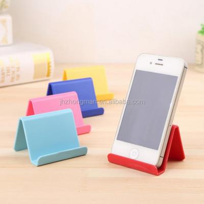 China Custom Shape Portable Waterproof Colorful Lazy Cute Stand Promotion Gift Promotion Logo Business Card Plastic Stent Mobile Phone Holder for sale