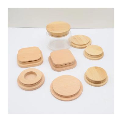 China China Customized Supplier Well Designed Natural Glass Wooden Candle Jar Lid for sale