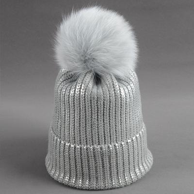 China Hot Sale Eco-friendly Gold Knitting Hats Fashion Autumn Winter Hats Fur Pom Pom Outdoor Warm Hat For Women Girl for sale