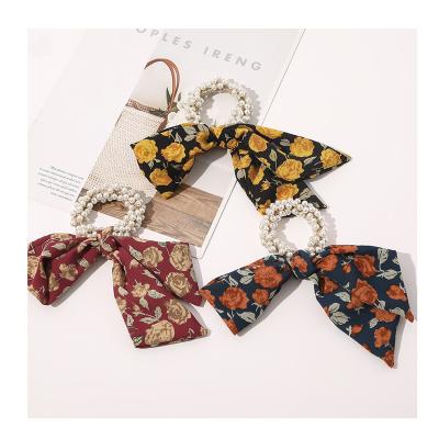 China Fashion Wholesale New Women Hair Accessories Vintage Simple Flower Long Scarf Pearl Elastic Hair Scrunchies for sale