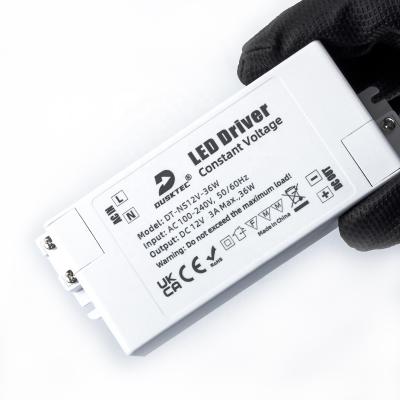 China LED Lighting DUSKTEC 3000mA 3A 36W Watt Constant Voltage AC 100-240 Volt DC 12V Slim LED Driver For TV Backlight for sale