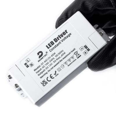 China LED Lighting DUSKTEC 5000mA 5A 60W Constant Voltage AC 100-240 Volt DC 12V Slim LED Driver For Panel Lights for sale