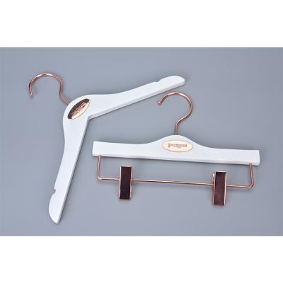 China Custom LOGO Luxury Premium Quality White Kids Minimalist Wooden Hanger with Rose Hook and Rose Clips for sale