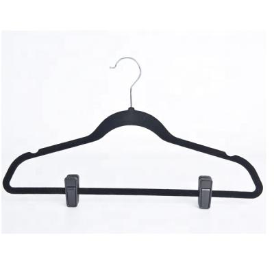 China Vintage Customize Slim Plastic Black Velvet Skirt Hanger With Clips for sale