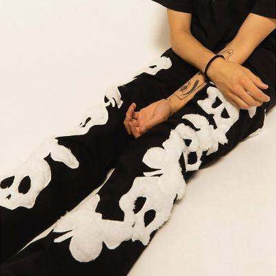 China Custom Anti-Wrinkle Logo Embroidery Jogger Pants Plus Size Mens Stack Drawstring Rocket Split Jogger Pants for sale