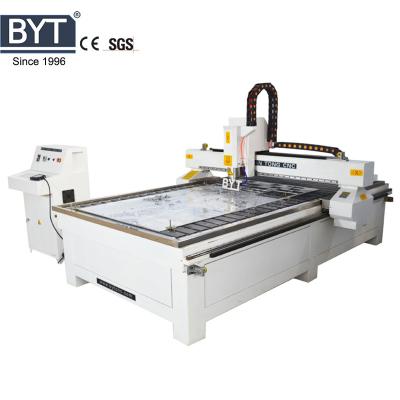 China Multifunction 3d Engraving Hotels and MDF Aluminum PVC Acrylic Stainless Steel Metal Wood Cutting Machine for sale