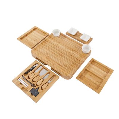 China Sustainable Wooden Bamboo Charcuterie Slide-Out 4 Drawer Magnetic Cheese Board Set With Ceramic Cutlery Bowls And Knife for sale