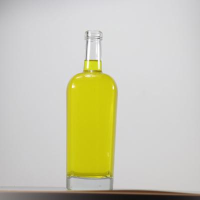 China Unique Clear Empty Designed Beverage 750ml Vodka Glass Bottle With Cork Or Cap for sale