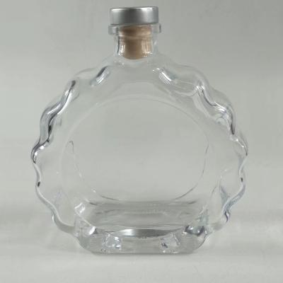 China Beverage Plant Flower Glass Bottle Wholesale Transparent Round Capacity 500ml for sale