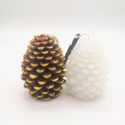 China Wholesale Custom Flameless Pillar Mold Pine Cone Parraffin Wax Figure Christmas Hurricane Candle for sale