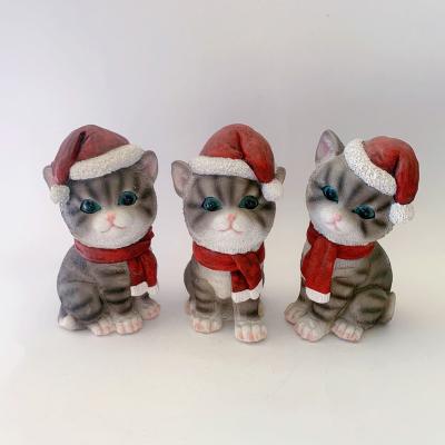 China Around the World Cat Ornament for Christmas Decoration Polyresin Christmas Ornament for sale