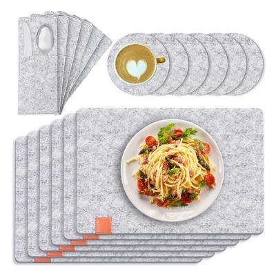 China Sustainable 18 Piece Table Mat Sets Heat Resistant Non-Slip Felt Place Mats with Coasters and Cutlery Bags for sale