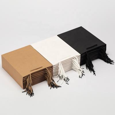 China Recycled Materials Store Ready Size Fast Delivery Brown Cardboard Paper Shopping Bag Packaging Bags For Clothes Shoes Jewelry Accessory for sale