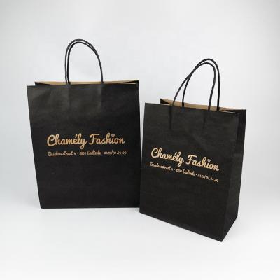 China Recycled Materials High Quality Custom Gold Stamping Printing Craft Kraft Paper Shopping Bag With Handle for sale