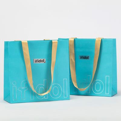 China Custom Luxury High Quality Recycled Materials Business Paper Bag Packaging Gift Art Paper Bag With Long Handle for sale