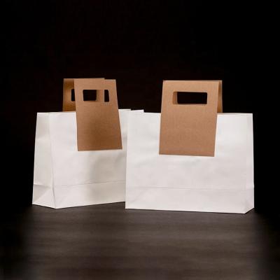 China Recycled Materials Recycle Custom Luxury White Card Paper Gift Shopping Bag With Brown Hole Handle Die Cut Handle for sale