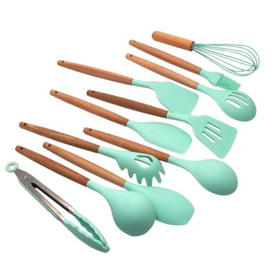 China 2021 Sustainable New Home Products Green Kitchenware 11 Pieces Silicone Handle Kitchen Utensils Wooden Battery Set for sale