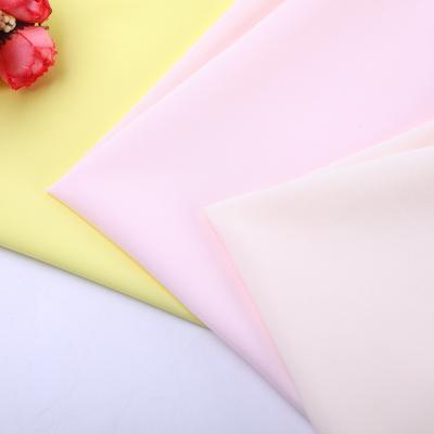 China Tear-Resistant 100% Multiple Colors Polyester Fabric 50D Garment Lining Fabric For Dress And Suit Lining for sale