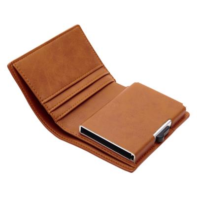 China RFID Blocking Protect RFID 2021 Blocking Crazy Horse Leather Push Button Aluminum Credit Card Holder Wallet for sale