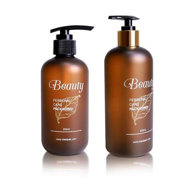 China Personal Care Products Custom Pump Bottle Amber Frosted 500ml Luxury Cosmetic Plastic Shampoo Bottles for sale