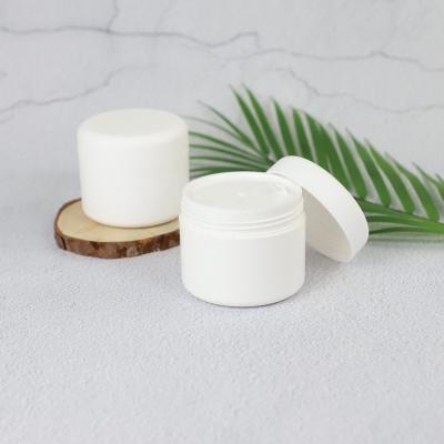 China Wholesale Custom Private Label 100g Personal Skin Care Packaging Plastic Cosmetic Cream Jars Double Wall Jar for sale