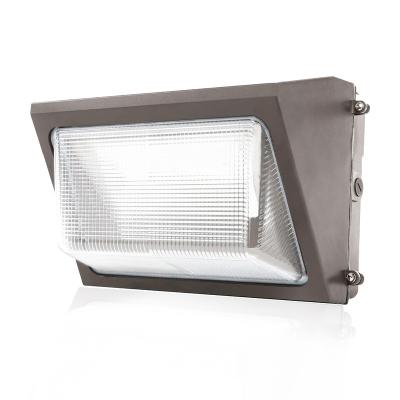 China Unborn outdoor waterproof polycarbonate 130lm/w 60w 80w 100w dusk led wall mount package lamp photocell dlc etl light fixtures for sale