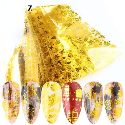 China Material and Eco-friendly Easy Apply Christmas Snowflake Nail Foil 10pcs/pack Gold Transfer Foil For Nails for sale