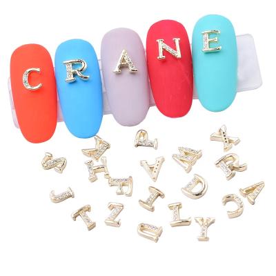 China 3d Nail Art DIY Decoration New English Letters Plated Gold Zircon 3D Nail Art Decoration for sale