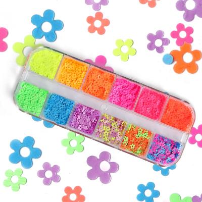 China Wholesale 12 Glowing Fluorescent Grid Flowers Nails Glitter Sequins for sale