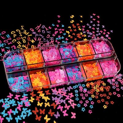 China DIY 3D Shiny Wholesale Fluorescent Butterfly Flower Nail Glitter Glitter for sale