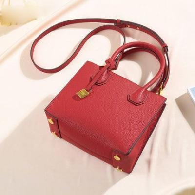 China Other Top Layer Cowhide Leather Handbags 2021 New Genuine Leather Tote Bag For Women Lock Single Shoulder Messenger Bag for sale