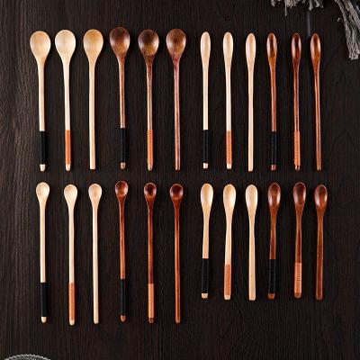 China Sustainable Factory Customized Engraving Logo Creative Long Handle Wooden Mixing Honey Spoon for sale