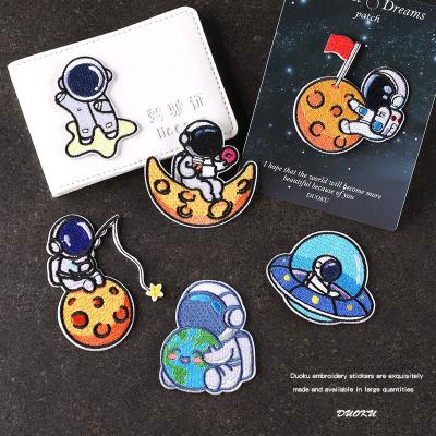 China Custom Cloth Planet Cartoon Astronaut Sticker Clothing Accessories Embroidery Patch Badge for sale