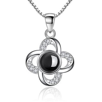 China Luxury Jewelry Wholesale Zircon 100 Tongues Projection Clover Necklace Dangle Women I Love You Shape Luxury Exquisite Carving for sale