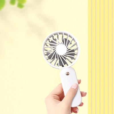 China Cute In Air Cooling Handheld Portable Mini Fans Pocket Round USB Folding Fan Custom Printed for sale